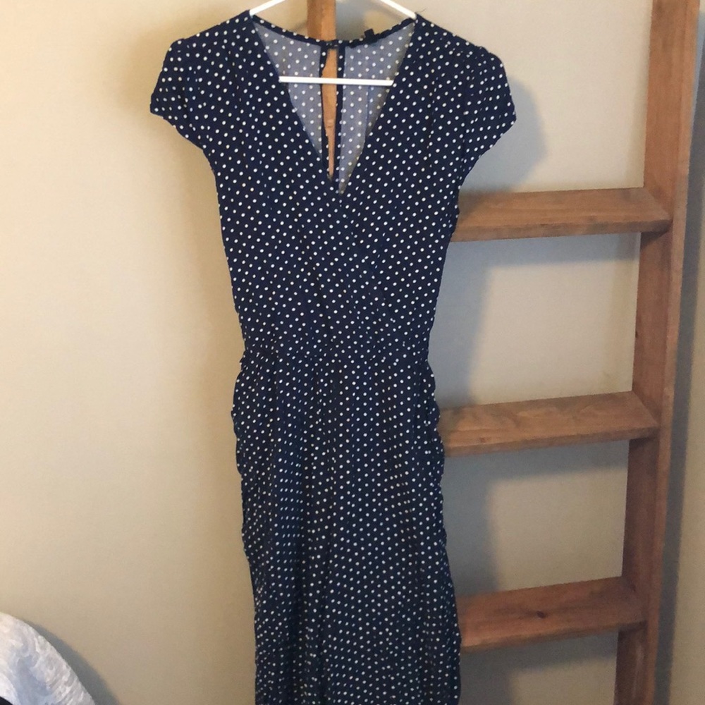 Navy blue and white polka dot jump suit